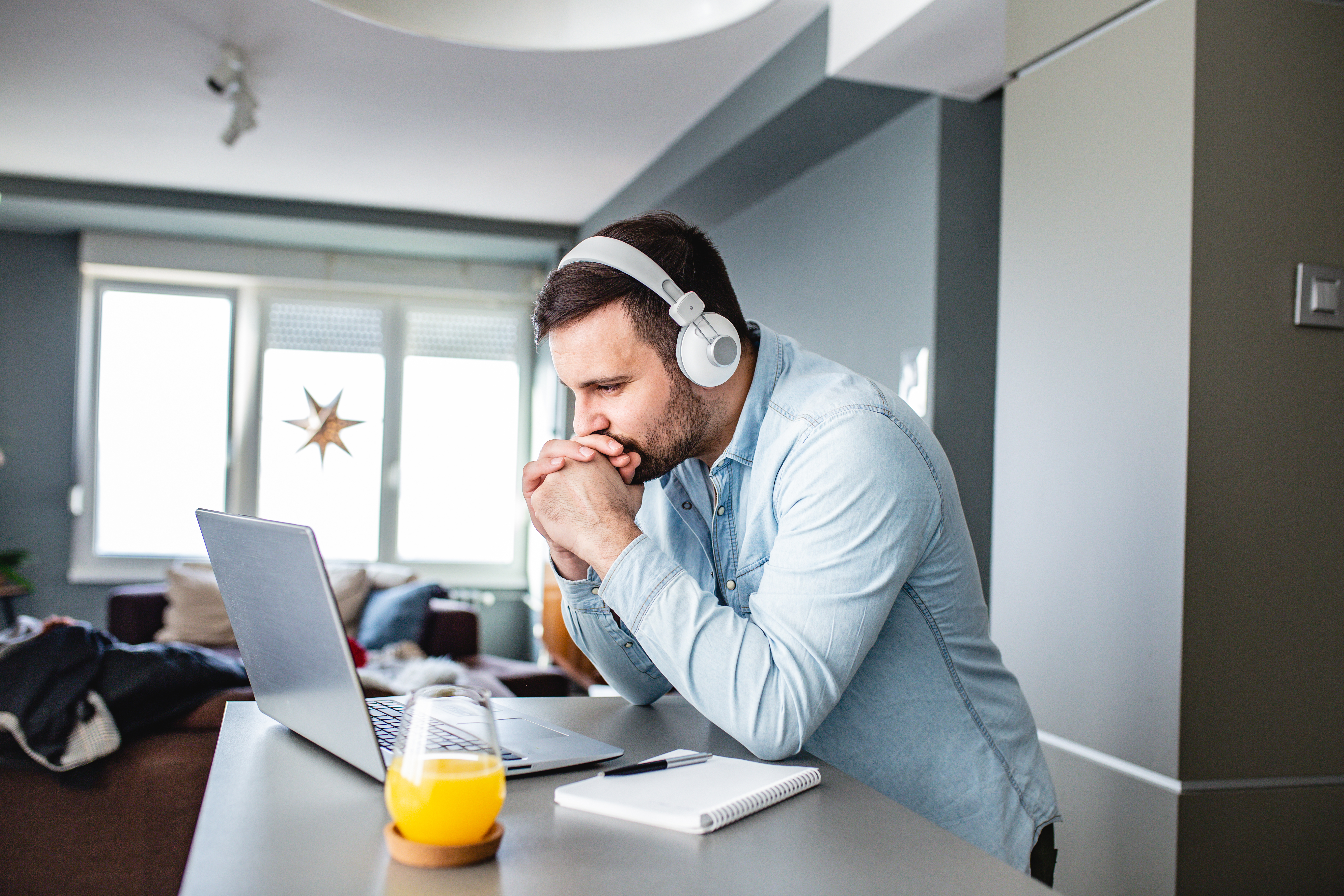 man-laptop-headphones